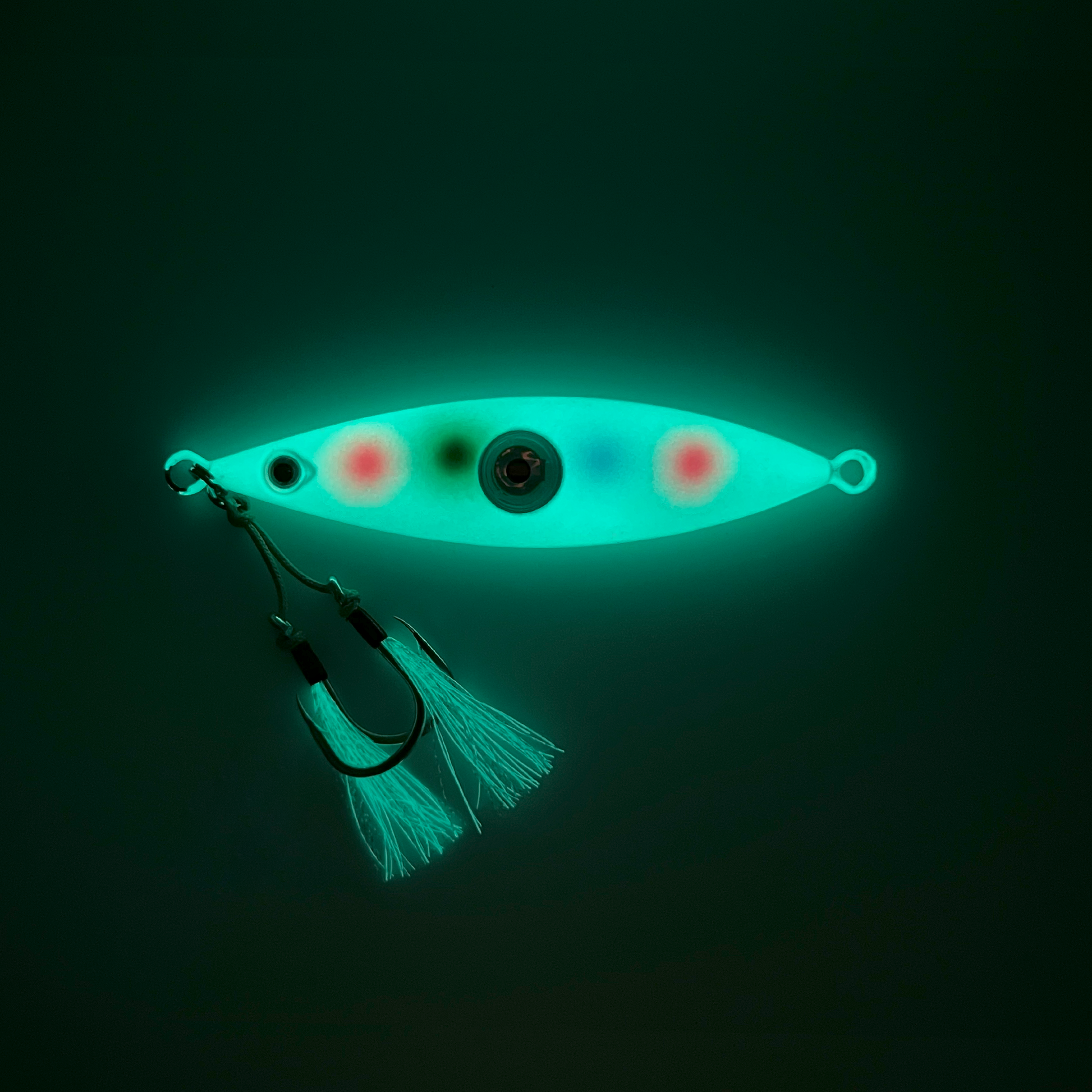 Multi-Color Dots lure showing full phosphorescent paint and skits glowing in the dark.